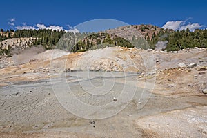 Steaming Pond and Colorful Mud  in a Hydrothermal area photo