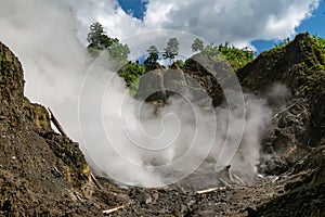 Steaming rushing from ground in Colo volcano, Indonesia photo