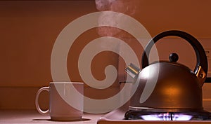 Steaming tea kettle photo