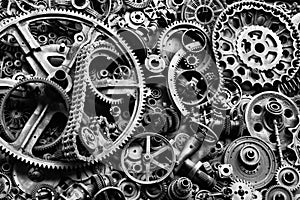 Steampunk background, machine and mechanical parts, large gears and chains from machines and tractors.