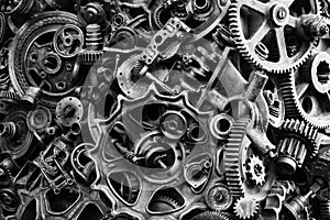 Steampunk background, machine and mechanical parts, large gears and chains from machines and tractors.