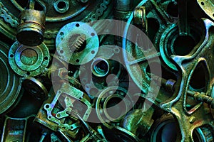 Steampunk background, machine and mechanical parts, large gears and chains from machines and tractors.