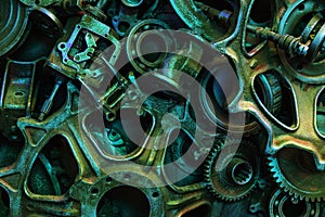 Steampunk background, machine and mechanical parts, large gears and chains from machines and tractors.