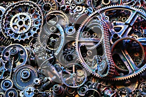 Steampunk background, machine and mechanical parts, large gears and chains from machines and tractors.