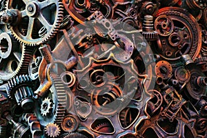 Steampunk background, machine and mechanical parts, large gears and chains from machines and tractors.