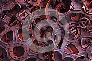 Steampunk background, machine and mechanical parts, large gears and chains from machines and tractors.