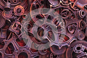 Steampunk background, machine and mechanical parts, large gears and chains from machines and tractors.