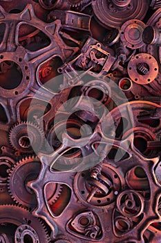 Steampunk background, machine and mechanical parts, large gears and chains from machines and tractors.