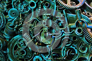 Steampunk background, machine and mechanical parts, large gears and chains from machines and tractors.