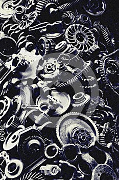 Steampunk background, machine and mechanical parts, large gears and chains from machines and tractors.