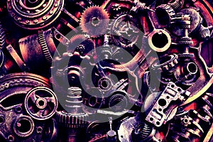 Steampunk background, machine and mechanical parts, large gears and chains from machines and tractors.