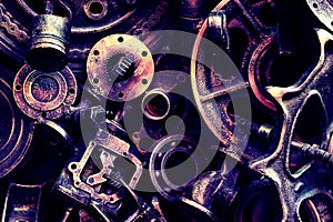 Steampunk background, machine and mechanical parts, large gears and chains from machines and tractors.