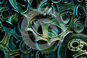 Steampunk background, machine and mechanical parts, large gears and chains from machines and tractors.