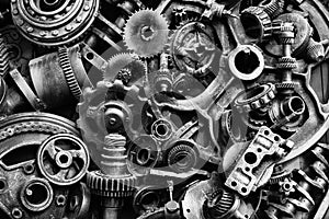 Steampunk background, machine and mechanical parts, large gears and chains from machines and tractors.