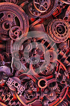 Steampunk background, machine and mechanical parts, large gears and chains from machines and tractors.