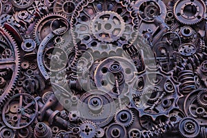 Steampunk background, machine and mechanical parts, large gears and chains from machines and tractors.