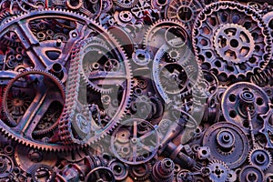 Steampunk background, machine and mechanical parts, large gears and chains from machines and tractors.