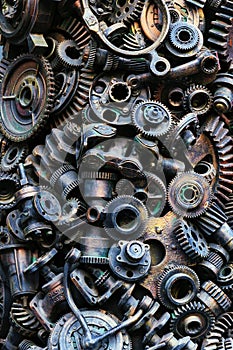 Steampunk background, machine and mechanical parts, large gears and chains from machines and tractors.