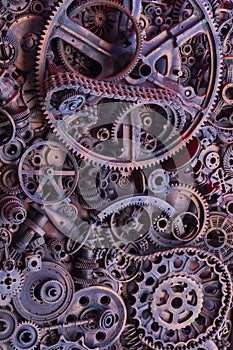 Steampunk background, machine parts, large gears and chains from machines and tractors.