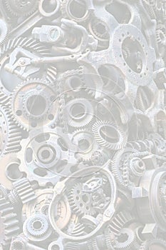 Steampunk background, machine parts, large gears and chains from machines and tractors.