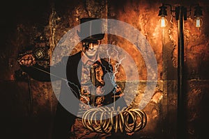 Steampunk man with Tesla coil on vintage steampunk background