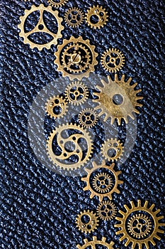 Steampunk mechanical cogs gears wheels on leather background