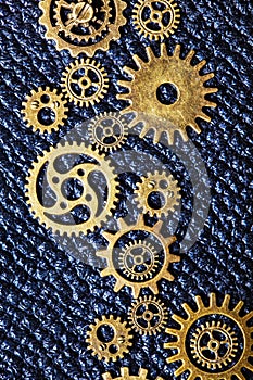 Steampunk mechanical cogs gears wheels on leather background