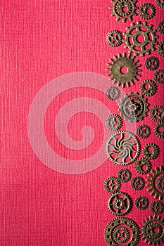 Steampunk mechanical cogs gears wheels on red background