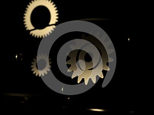 Steampunk mechanism - 3d render illustration. Gears, flying metal spheres and gold rings