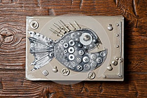 Steampunk style fish piranha. Mechanical animal photo.