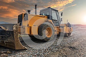 A steamroller at a road construction site