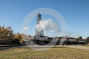 Steamtrain and a Wooden Drilling Rig