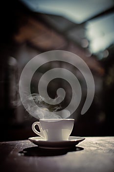 Steamy coffee cup in the sunlight