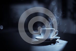 Steamy coffee cup in the sunlight