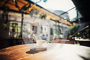 Steamy coffee cup in the sunlight