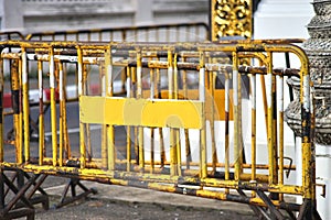 Steel barricades blocking traffic on the road