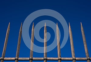 Steel bars fence with blue sky