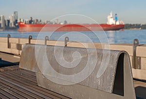 Steel Bench on Pier with Ship