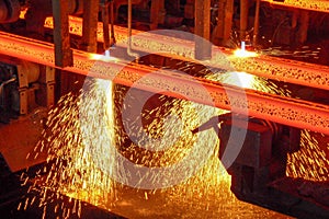 Steel billets at torch cutting photo