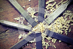 Steel blades many chisels and sawdust chippings with vintage ef