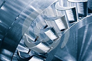 Steel blades of turbine propeller. Close-up view. In B/W. Selected focus on foreground, engineering technology concept