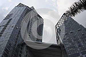 Steel blue glass high rise building skyscrapers, industrial architecture