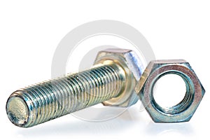 Steel bolt and nut on white background