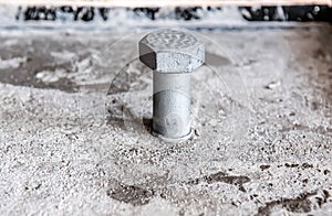 Steel bolt in reinforced concrete