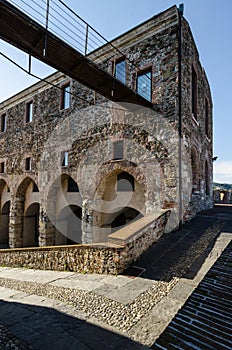 Steel bridge on an ancient structure photo