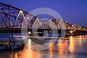 Steel bridge of Bangkok under twilight light