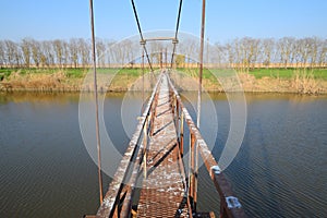 Steel bridge and gas pipeline through irrigation canal