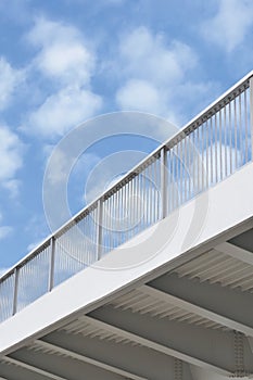 Steel bridge girder span, blue grey metal pillar guardrails, modern contemporary industrial flyover overpass railings perspective