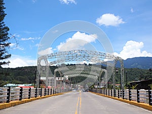 Steel bridge over river in Boquete, Panama