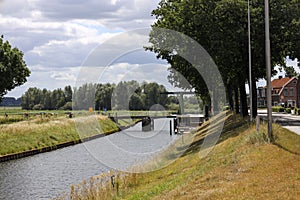 Steel bridge over water Apeldoorns Kanaal in Hattem